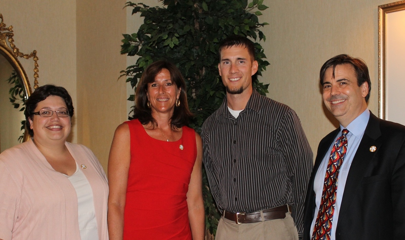 At the June 6 awards ceremony at Dover Downs Hotel honoring volunteers are (l-r) Autism Delaware Executive Director Teresa Avery; Autism Delaware President Marcy Kempner; Brian Redding, supervisor in the pharmacy stock area of Christiana Health Care, recipient of the Noel Perry Smith Award; and Autism Delaware Secretary John Fisher Gray.